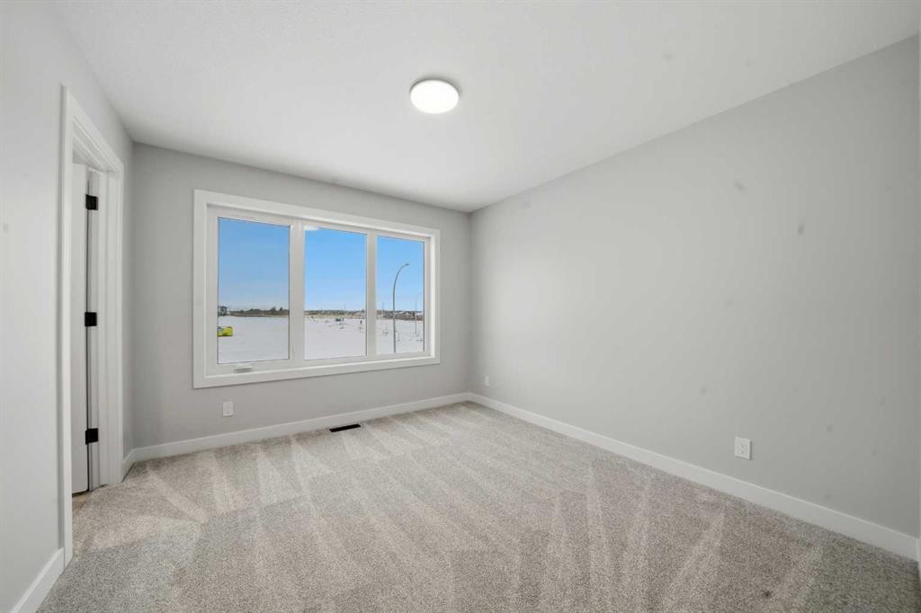 17 Gray Close, Sylvan Lake, AB - Indoor Photo Showing Other Room
