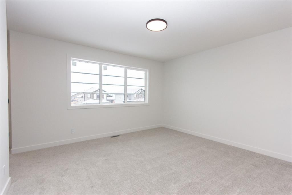 12 Trinity Street, Lacombe, AB - Indoor Photo Showing Other Room
