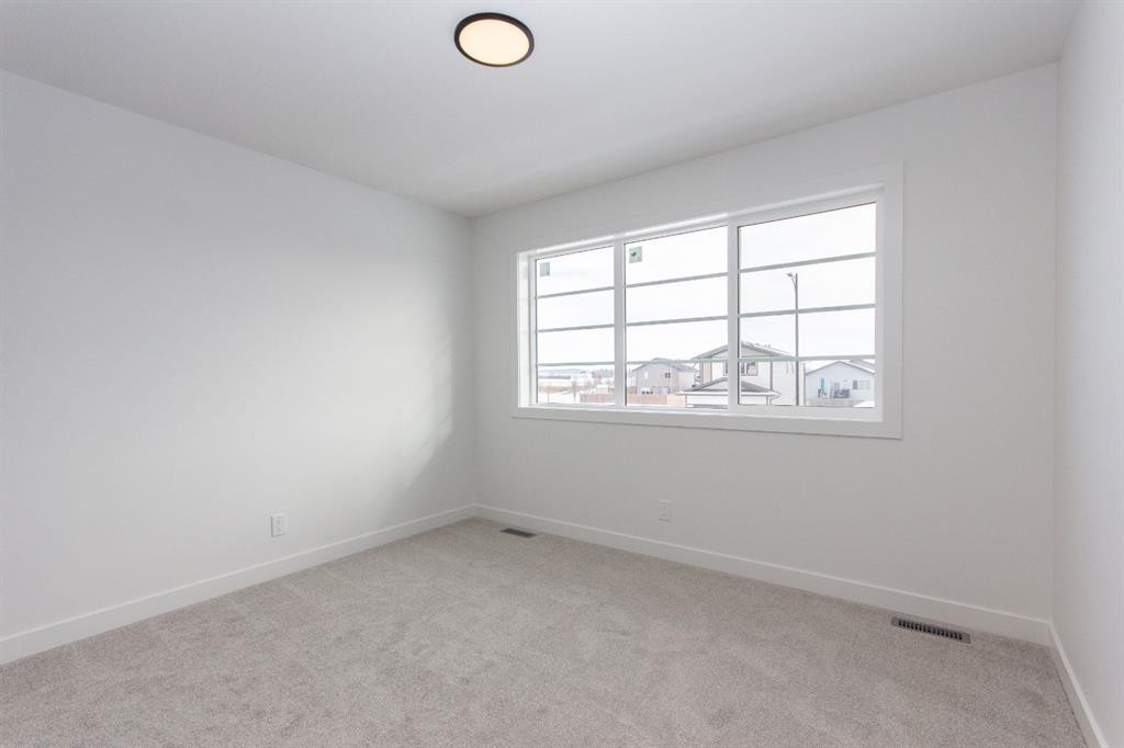 12 Trinity Street, Lacombe, AB - Indoor Photo Showing Other Room