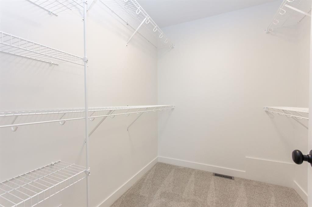 12 Trinity Street, Lacombe, AB - Indoor With Storage