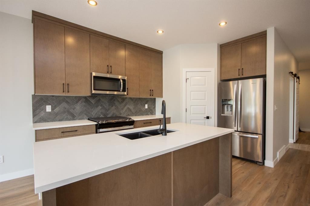 37 Terra Close, Red Deer, AB - Indoor Photo Showing Kitchen With Stainless Steel Kitchen With Double Sink With Upgraded Kitchen