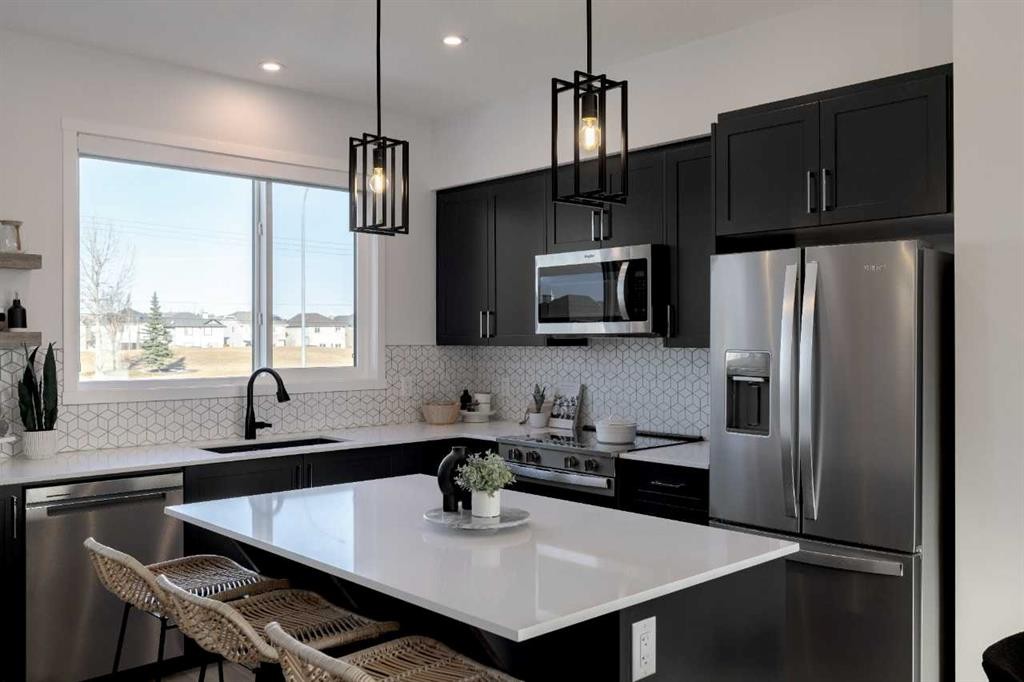 209-81 Midtown Boulevard Sw, Airdrie, AB - Indoor Photo Showing Kitchen With Upgraded Kitchen