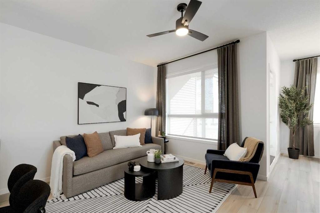 209-81 Midtown Boulevard Sw, Airdrie, AB - Indoor Photo Showing Living Room