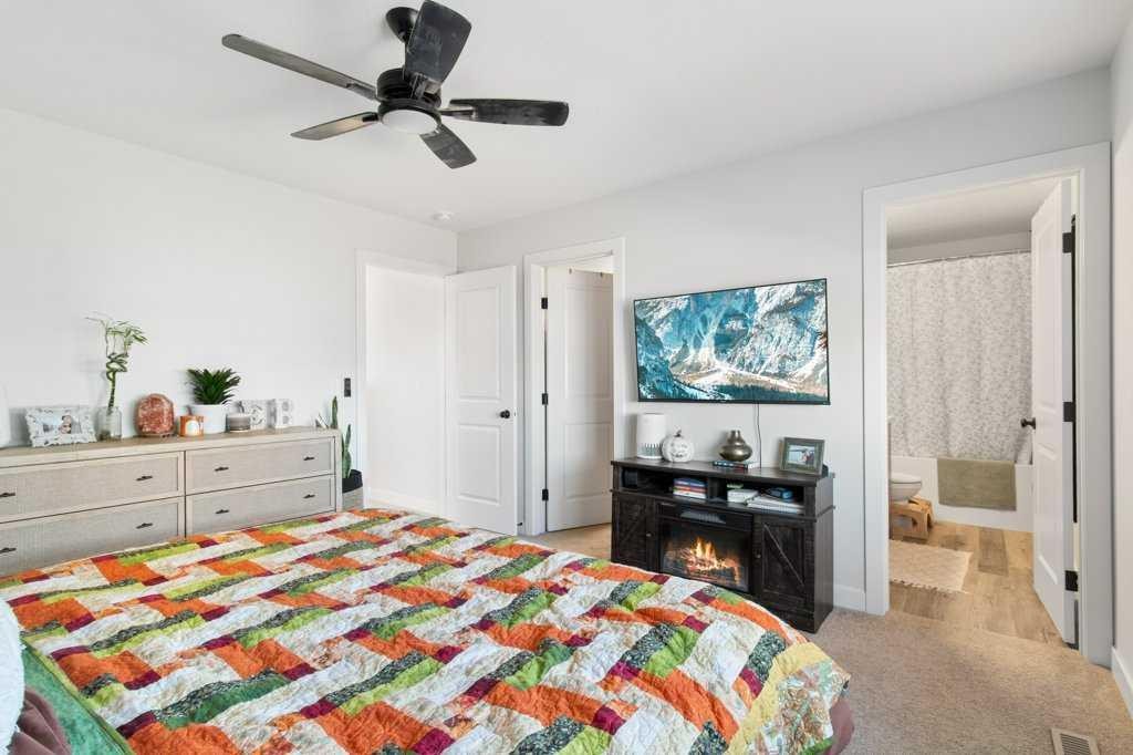 16 Trinity Street, Lacombe, AB - Indoor Photo Showing Bedroom