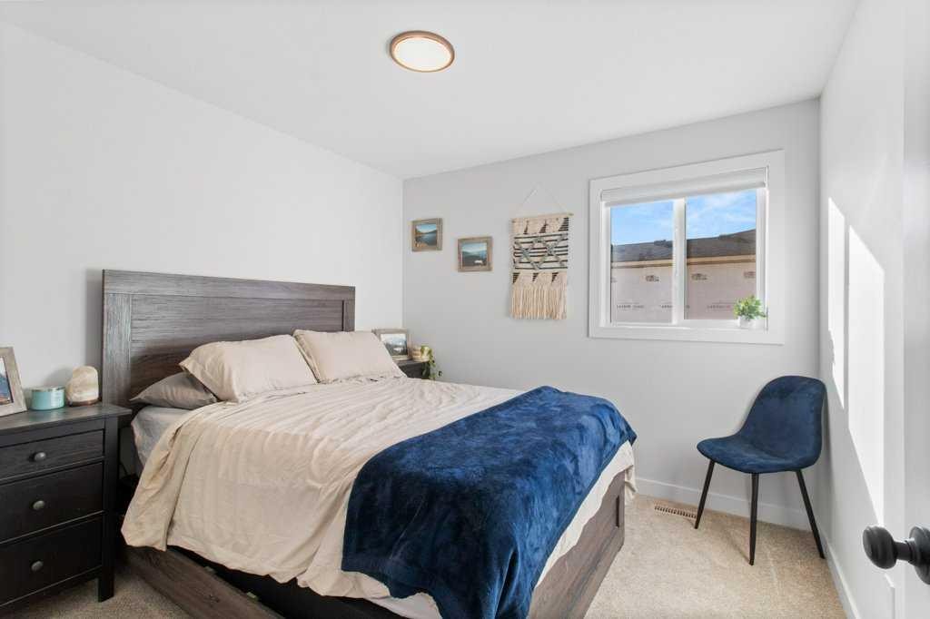 16 Trinity Street, Lacombe, AB - Indoor Photo Showing Bedroom
