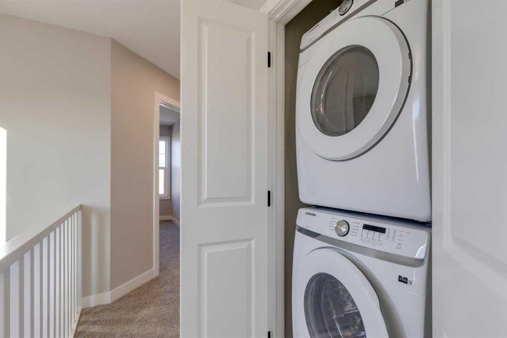 315 Fireside Drive, Cochrane, AB - Indoor Photo Showing Laundry Room