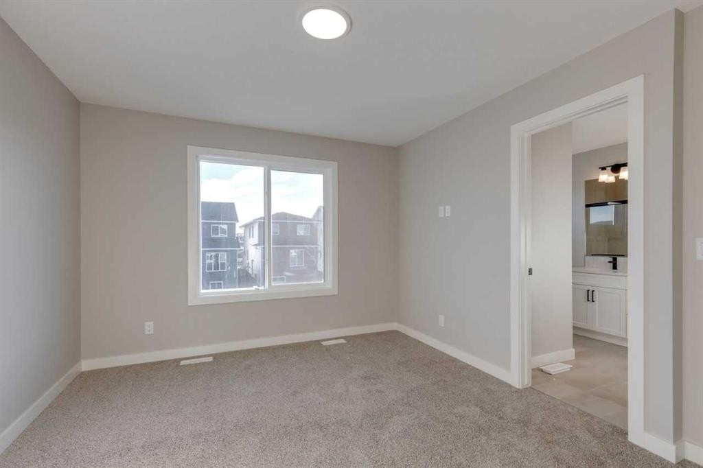 315 Fireside Drive, Cochrane, AB - Indoor Photo Showing Other Room