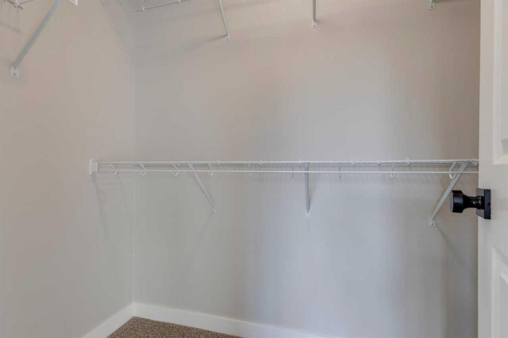 315 Fireside Drive, Cochrane, AB - Indoor With Storage