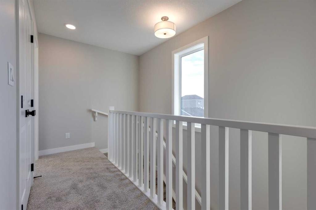 315 Fireside Drive, Cochrane, AB - Indoor Photo Showing Other Room
