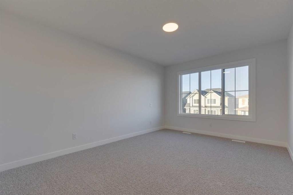 367 Fireside Drive, Cochrane, AB - Indoor Photo Showing Other Room