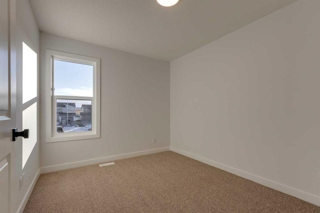 371 Fireside Drive, Cochrane, AB - Indoor Photo Showing Other Room