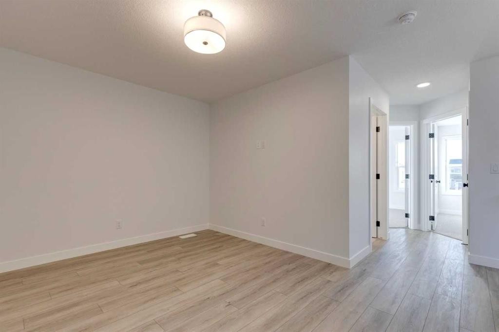 371 Fireside Drive, Cochrane, AB - Indoor Photo Showing Other Room