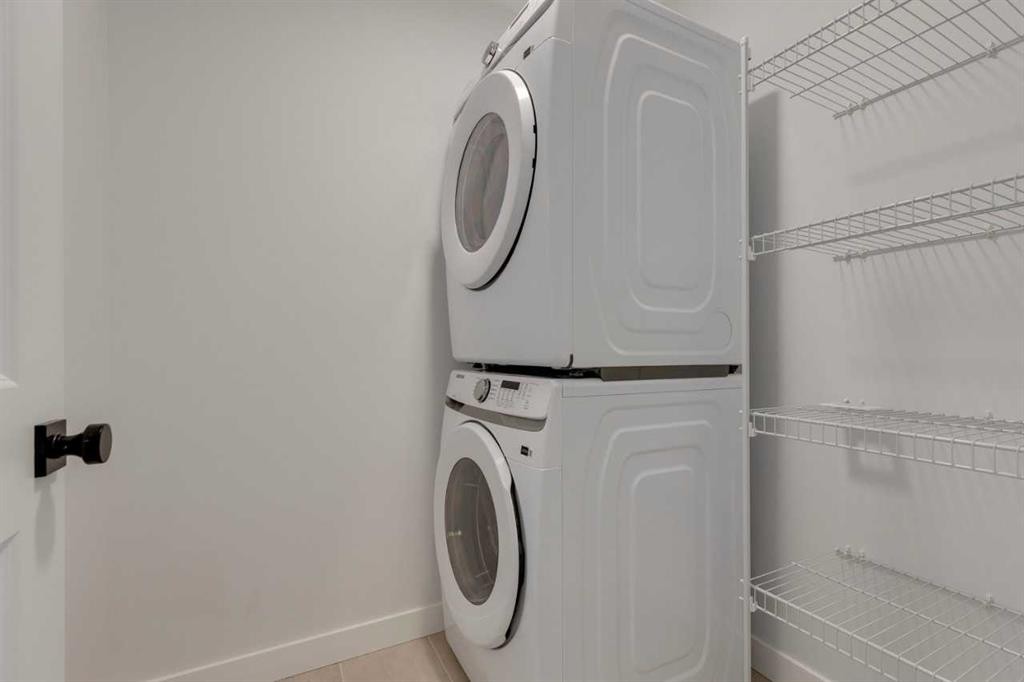 371 Fireside Drive, Cochrane, AB - Indoor Photo Showing Laundry Room