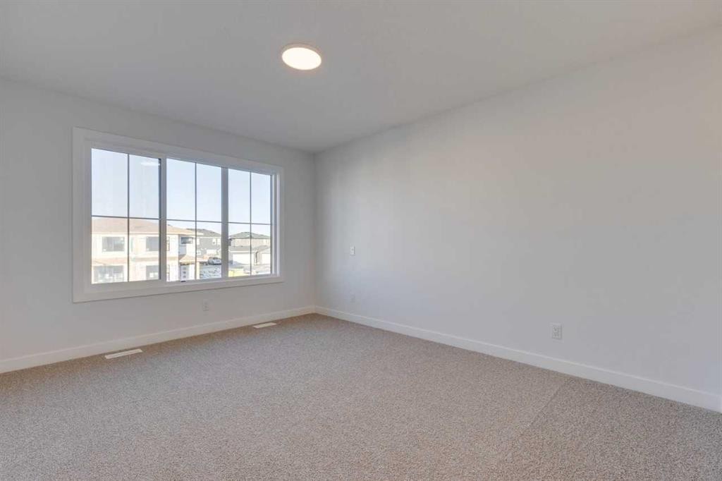 371 Fireside Drive, Cochrane, AB - Indoor Photo Showing Other Room