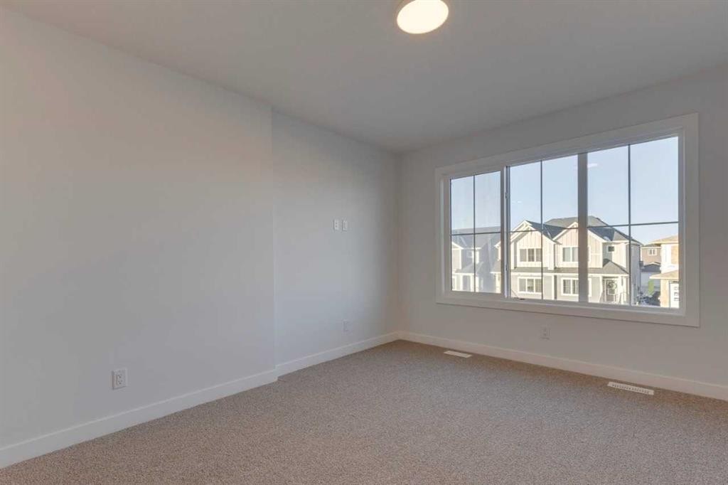 371 Fireside Drive, Cochrane, AB - Indoor Photo Showing Other Room