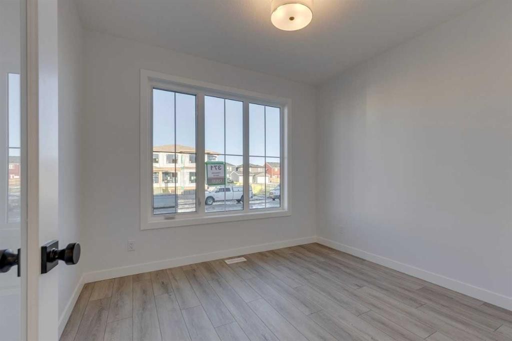 371 Fireside Drive, Cochrane, AB - Indoor Photo Showing Other Room