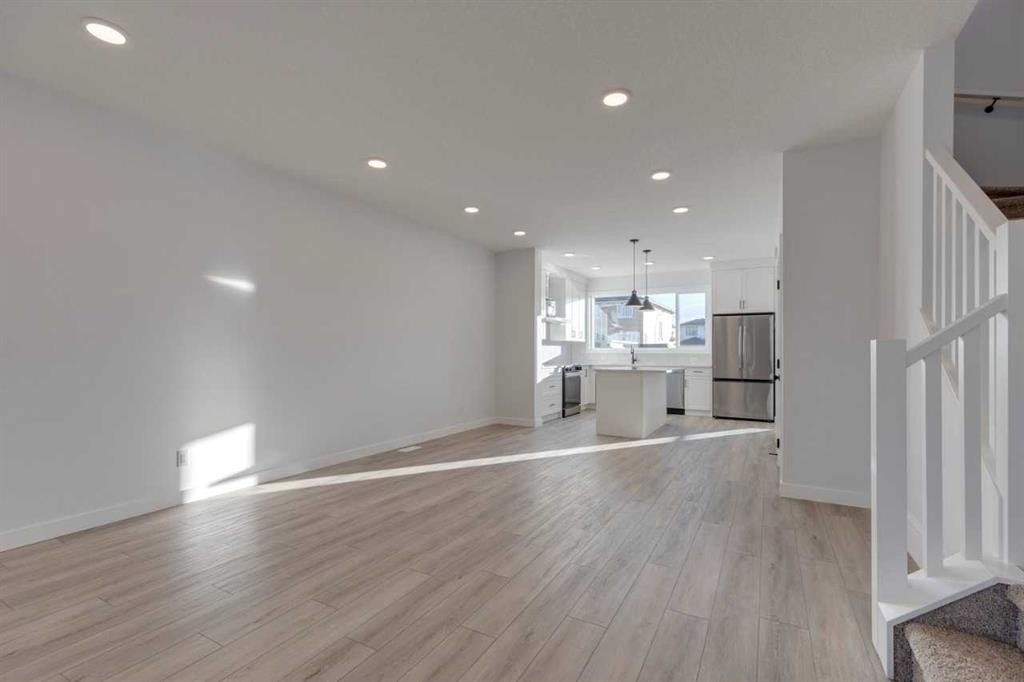 371 Fireside Drive, Cochrane, AB - Indoor Photo Showing Other Room