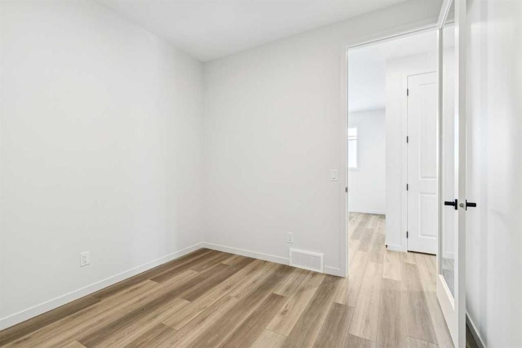 16 Calhoun Rise Ne, Calgary, AB - Indoor Photo Showing Other Room