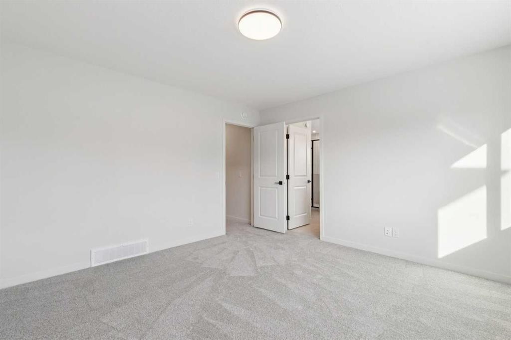 16 Calhoun Rise Ne, Calgary, AB - Indoor Photo Showing Other Room