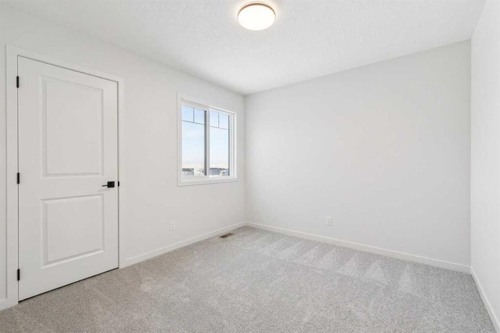 16 Calhoun Rise Ne, Calgary, AB - Indoor Photo Showing Other Room