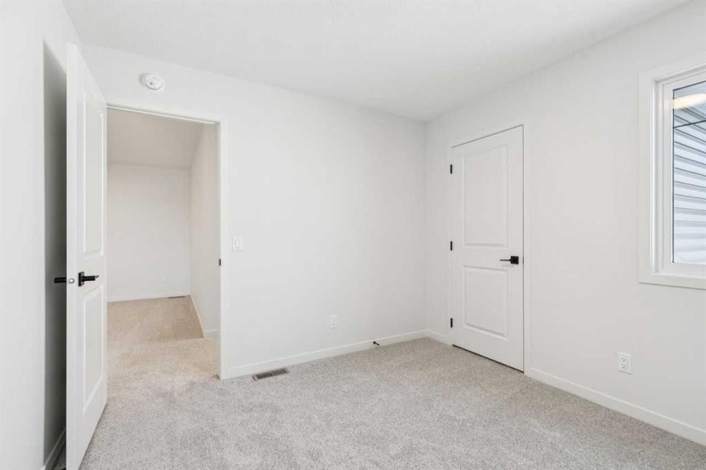 16 Calhoun Rise Ne, Calgary, AB - Indoor Photo Showing Other Room