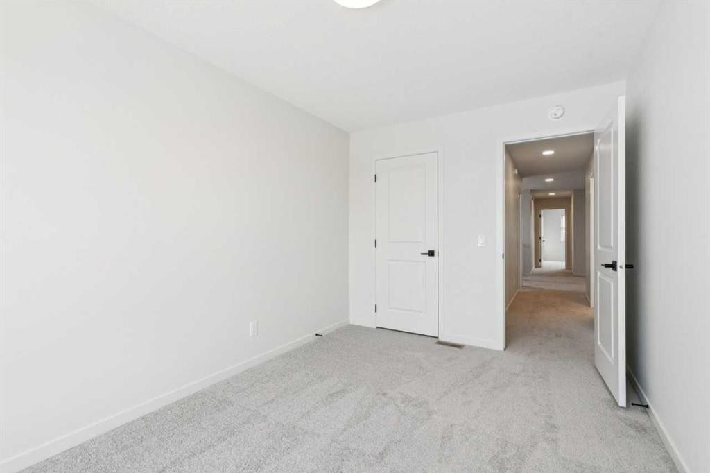 16 Calhoun Rise Ne, Calgary, AB - Indoor Photo Showing Other Room