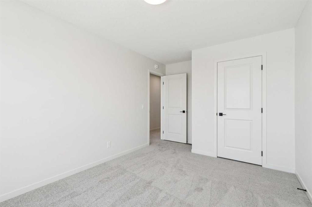 16 Calhoun Rise Ne, Calgary, AB - Indoor Photo Showing Other Room