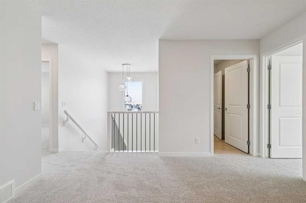 28 Calhoun Rise Ne, Calgary, AB - Indoor Photo Showing Other Room