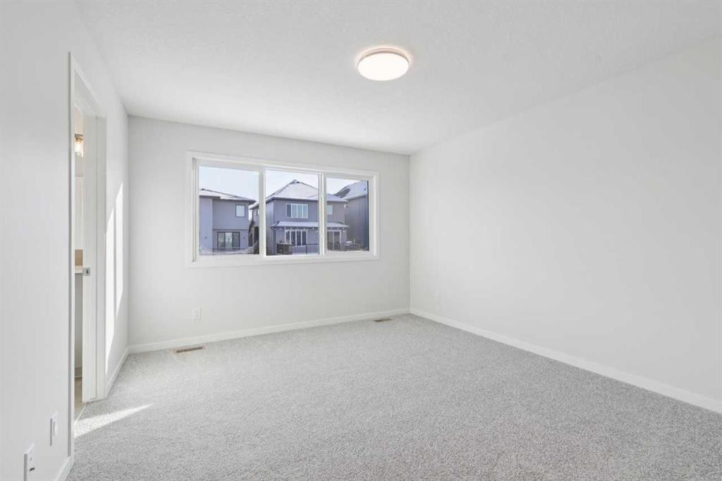 28 Calhoun Rise Ne, Calgary, AB - Indoor Photo Showing Other Room