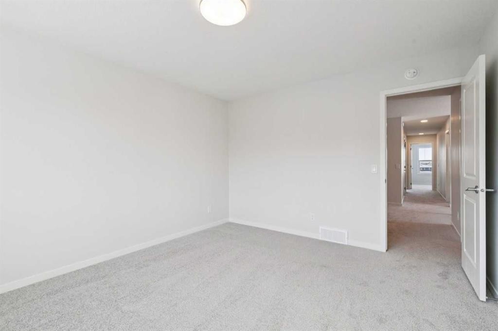 28 Calhoun Rise Ne, Calgary, AB - Indoor Photo Showing Other Room