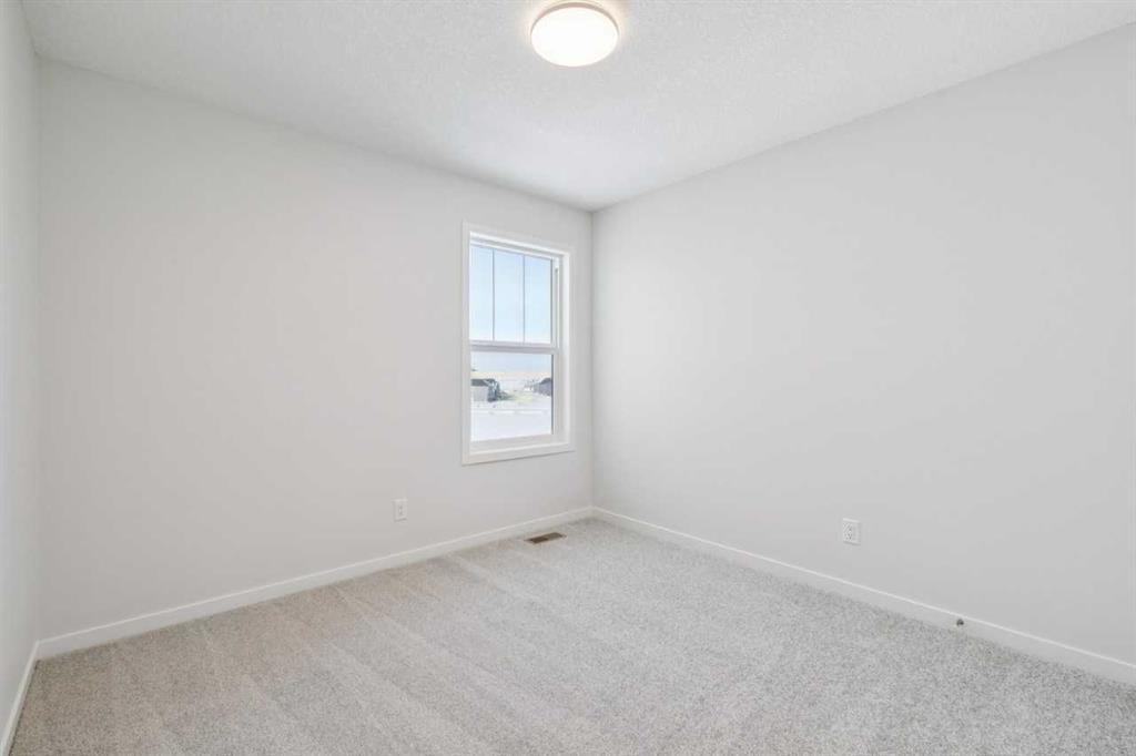 28 Calhoun Rise Ne, Calgary, AB - Indoor Photo Showing Other Room