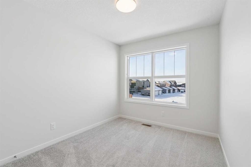 28 Calhoun Rise Ne, Calgary, AB - Indoor Photo Showing Other Room