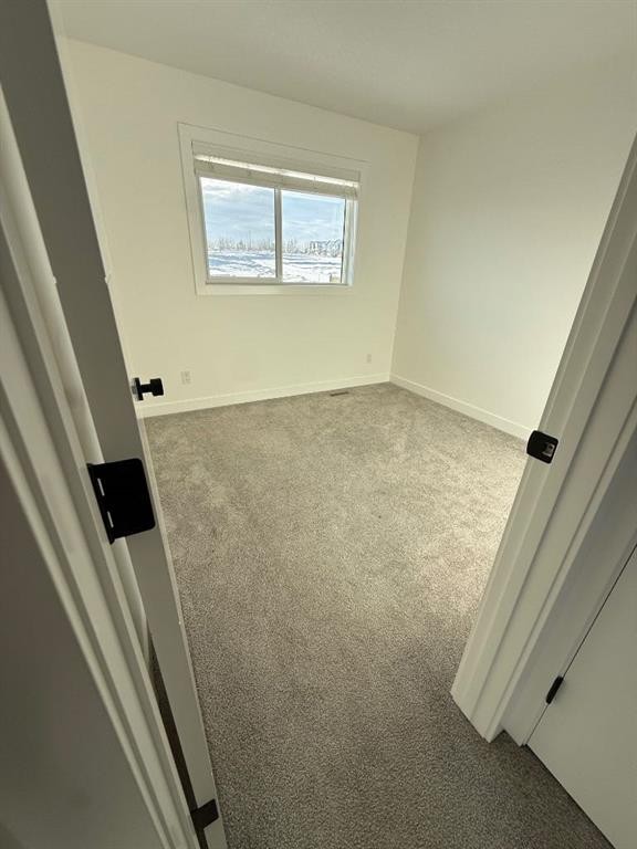 18 Violet Point, Sylvan Lake, AB - Indoor Photo Showing Other Room
