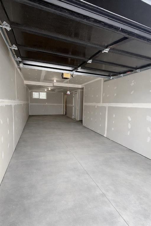 18 Violet Point, Sylvan Lake, AB - Indoor Photo Showing Garage