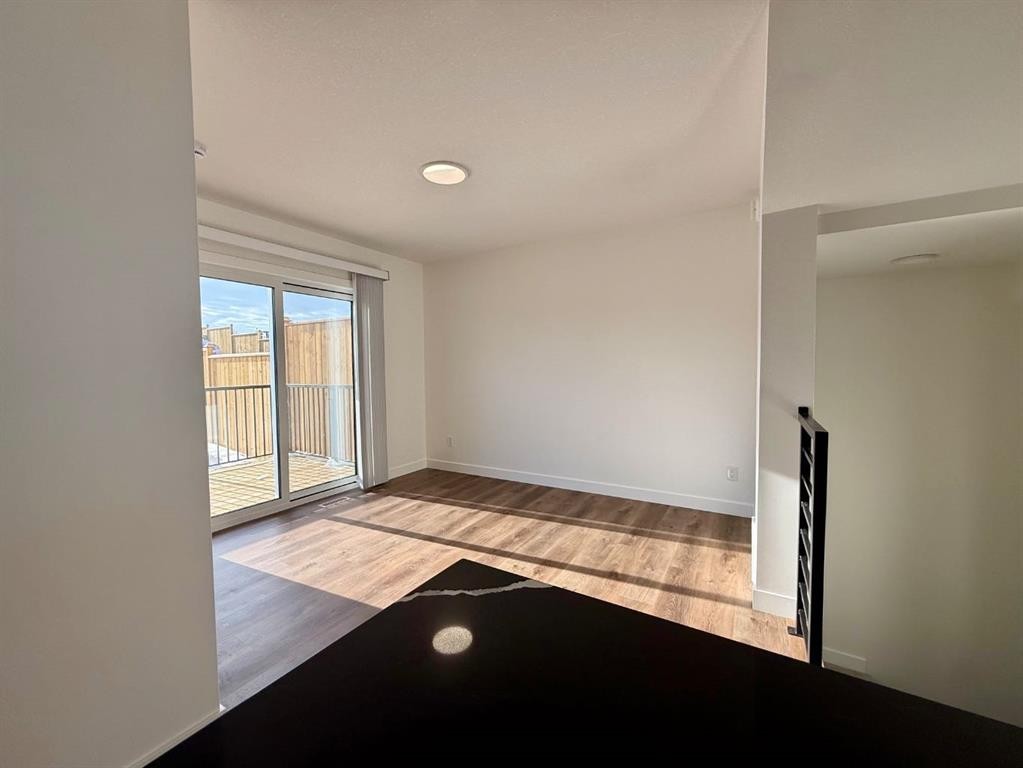 18 Violet Point, Sylvan Lake, AB - Indoor Photo Showing Other Room