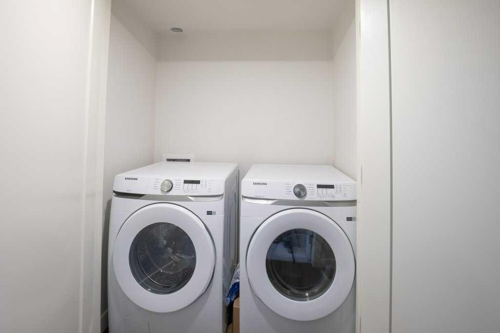 10 Twin Rose Court, Jarvis Bay, AB - Indoor Photo Showing Laundry Room