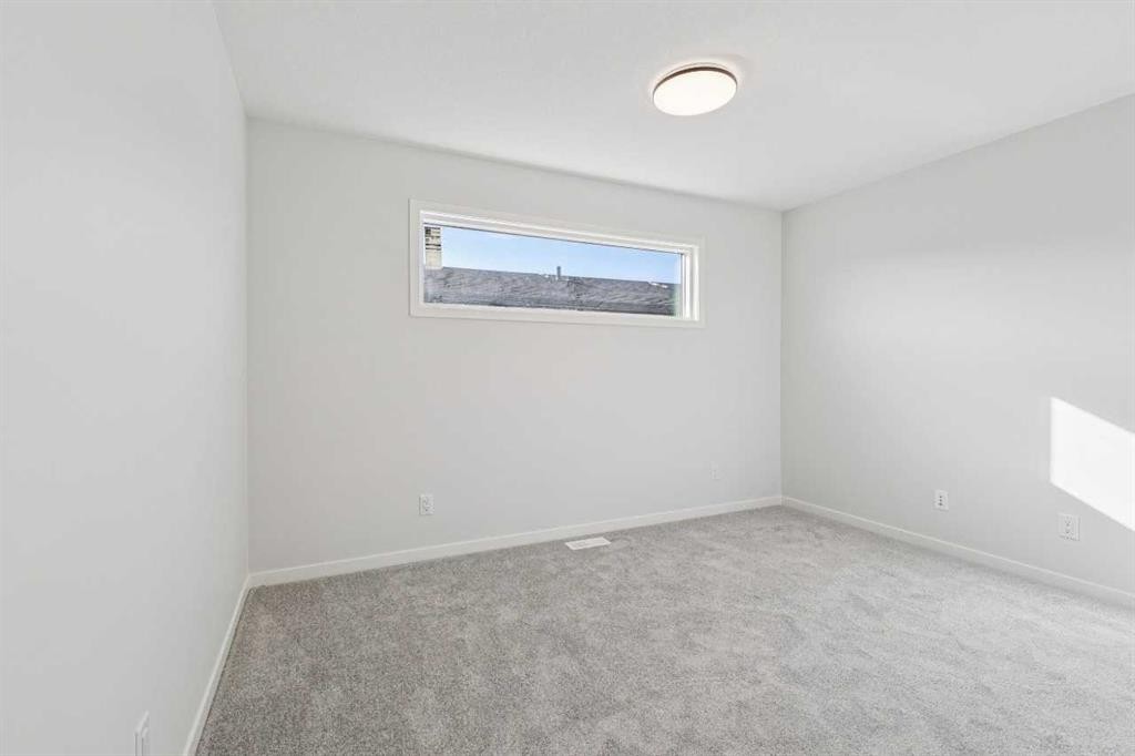 572 Belmont Heath Sw, Calgary, AB - Indoor Photo Showing Other Room