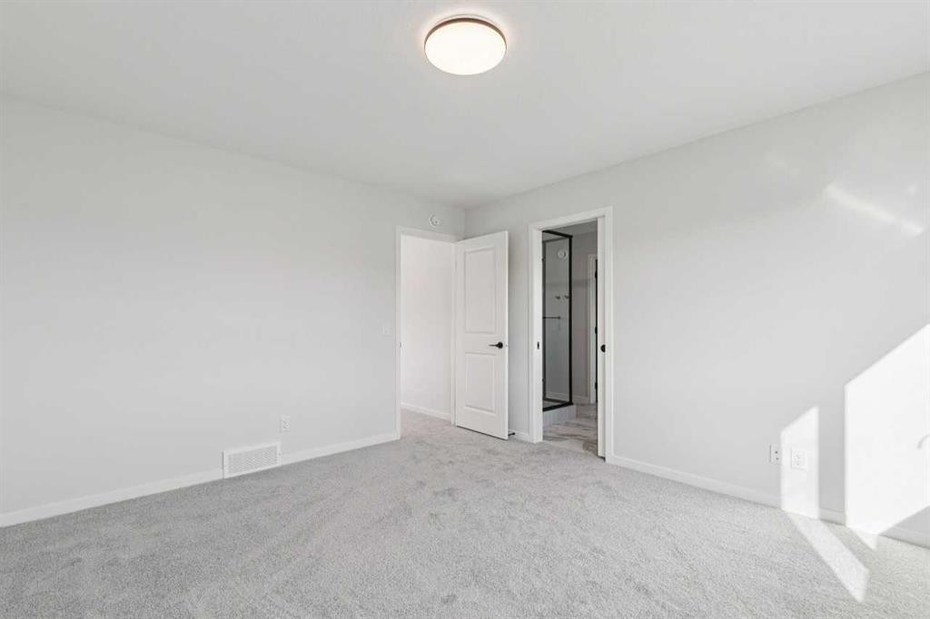 572 Belmont Heath Sw, Calgary, AB - Indoor Photo Showing Other Room