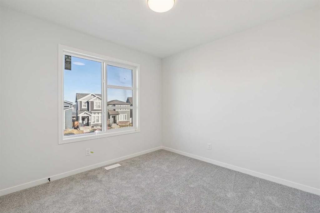 572 Belmont Heath Sw, Calgary, AB - Indoor Photo Showing Other Room