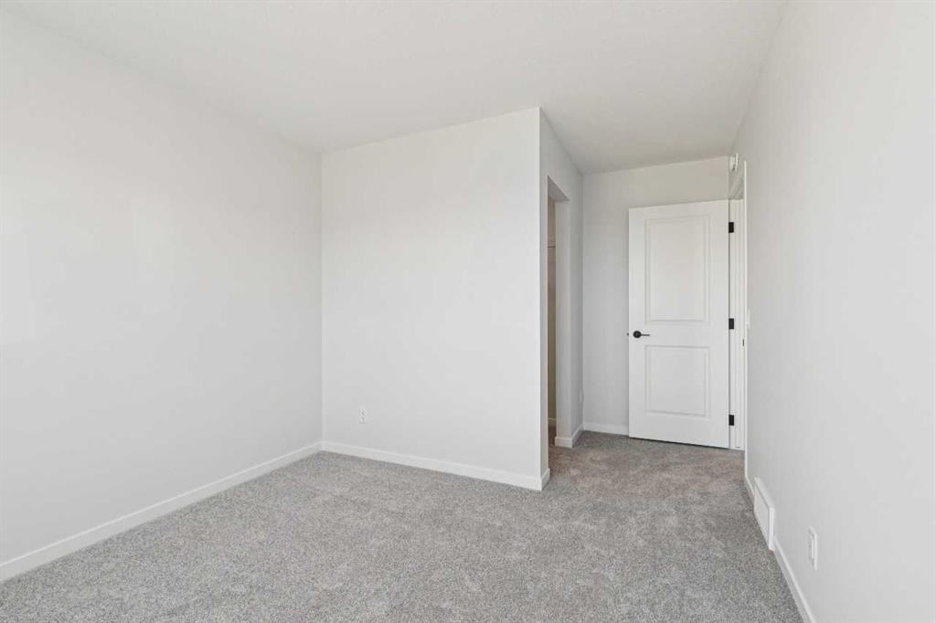 572 Belmont Heath Sw, Calgary, AB - Indoor Photo Showing Other Room