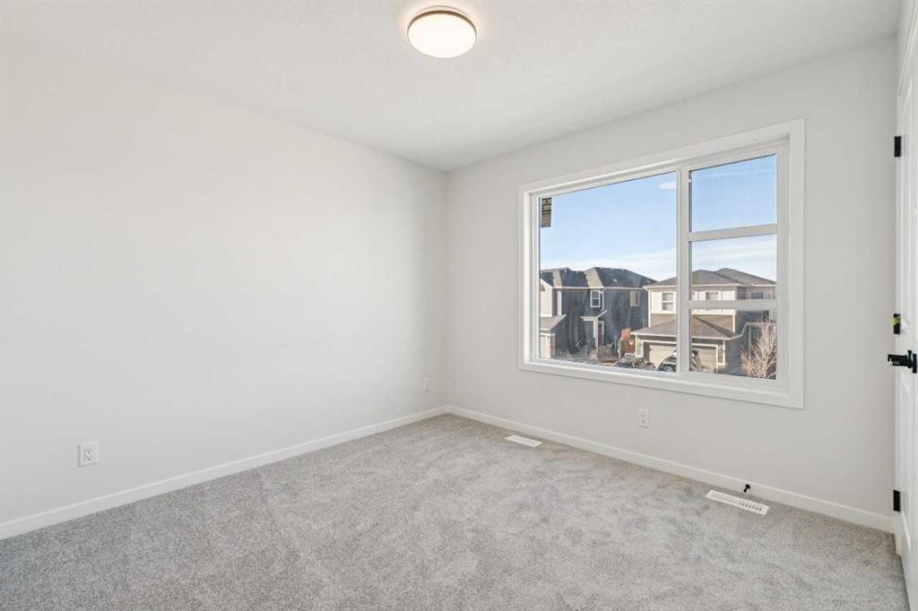572 Belmont Heath Sw, Calgary, AB - Indoor Photo Showing Other Room