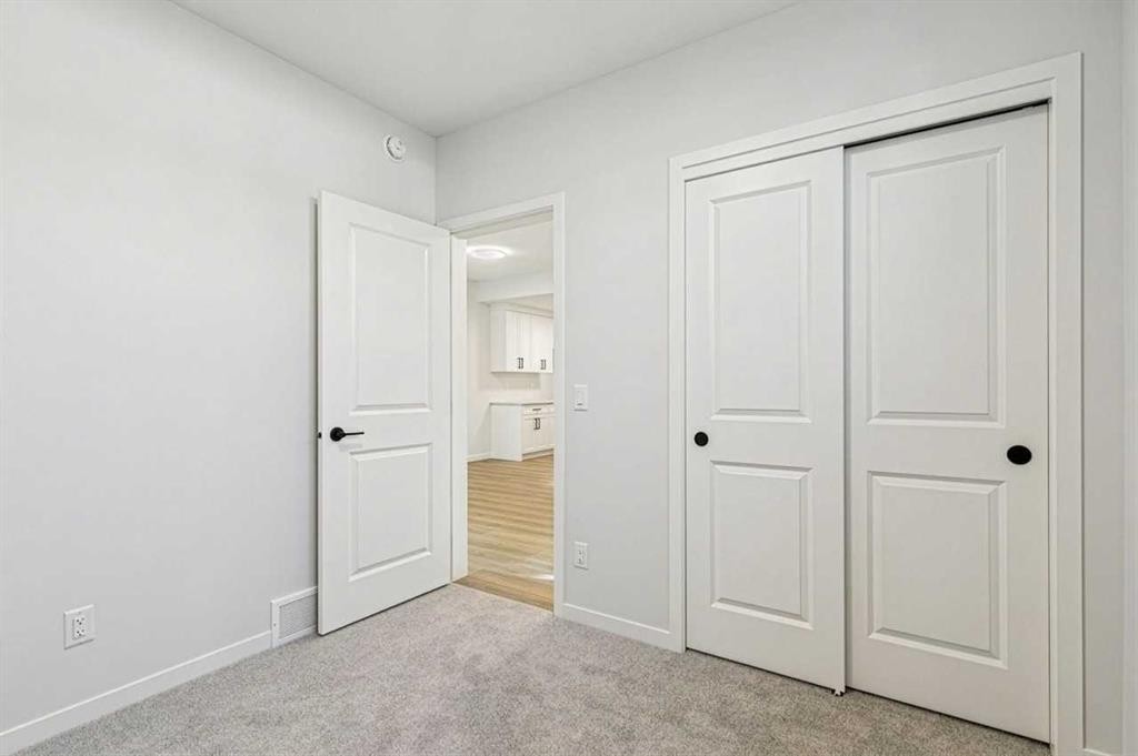 572 Belmont Heath Sw, Calgary, AB - Indoor Photo Showing Other Room