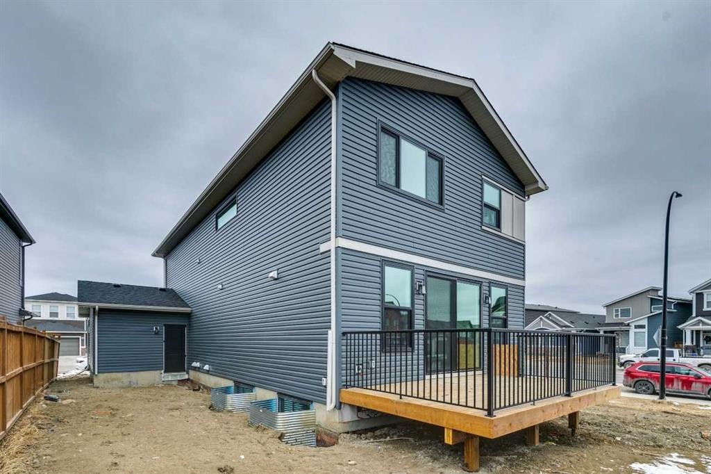 572 Belmont Heath Sw, Calgary, AB - Outdoor With Deck Patio Veranda With Exterior