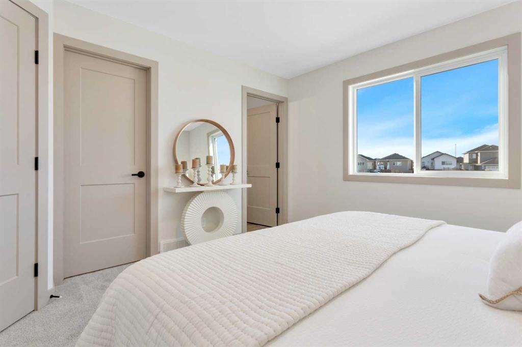 120 Hampton Crescent, Sylvan Lake, AB - Indoor Photo Showing Bedroom