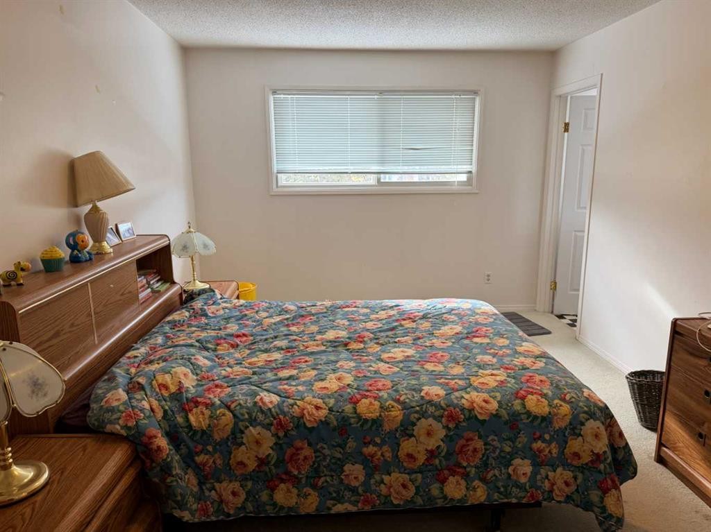 150 Piper Drive, Red Deer, AB - Indoor Photo Showing Bedroom