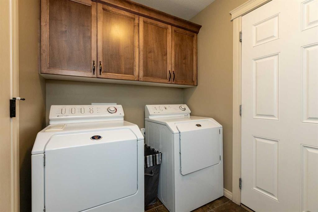6371 Cedar Way, Innisfail, AB - Indoor Photo Showing Laundry Room