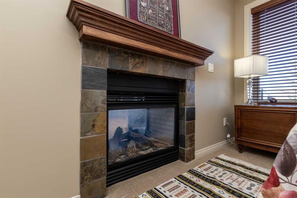 6371 Cedar Way, Innisfail, AB - Indoor With Fireplace