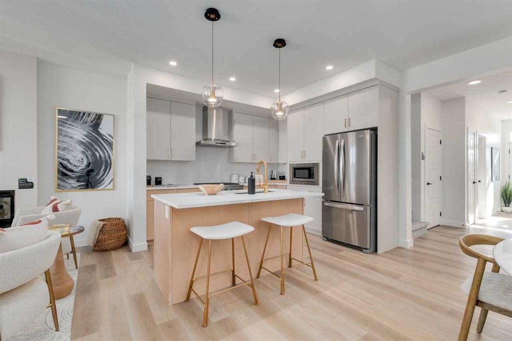 240 Layton Link Se, Airdrie, AB - Indoor Photo Showing Kitchen With Upgraded Kitchen