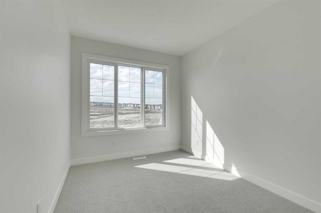 182 Lanark Gate Se, Airdrie, AB - Indoor Photo Showing Other Room