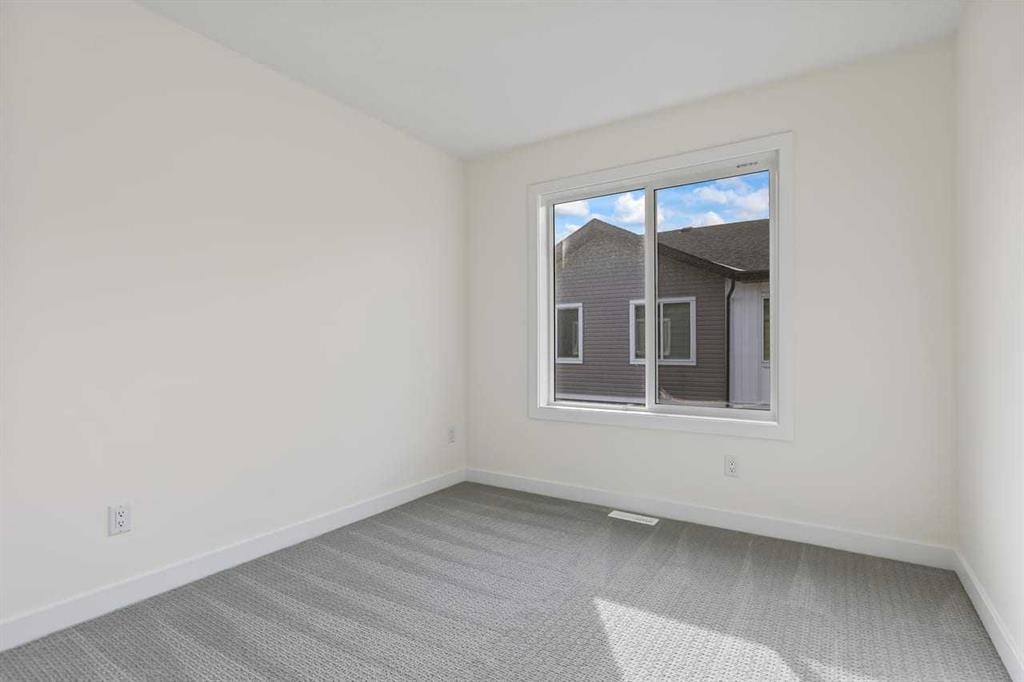 42 Corner Glen Manor Ne, Calgary, AB - Indoor Photo Showing Other Room